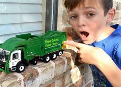 Image result for 1960s White Toy Garbage Truck