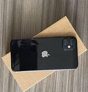 Image result for Black iPhone 11 On Table