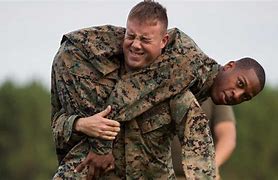 Image result for Fireman Carry Marine Corps
