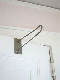 Image result for Adjustable Metal Over the Door Hanger