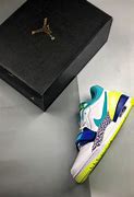 Image result for Jordan Low 312 Yellow and White