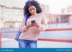 Image result for Black Woman Holding Cell Phone