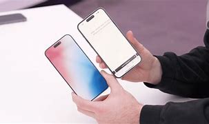 Image result for Tesla iPhone vs iPhone 15Promax