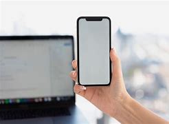 Image result for Phone in Front Computer