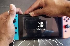 Image result for Reset Nintendo Switch Lite From Off