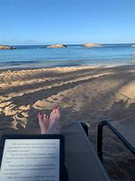 Image result for Kindle Paperwhite On Beach