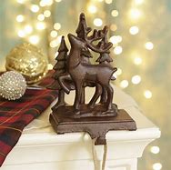 Image result for Reindeer Stocking Holders for Mantle