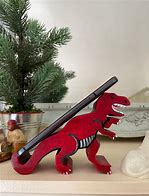 Image result for Dino Phone Holder