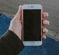 Image result for iPhone 6 Plus in Hand