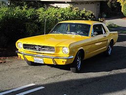 Image result for Yellow 65 Mustang