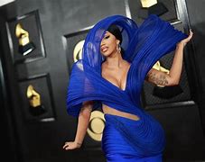 Image result for Cardi B Suit Ripping