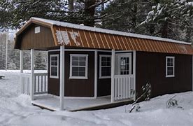Image result for Man Arrested for Building Cabin Filled with Pictures