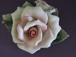 Image result for Porcelain Rose Figurine