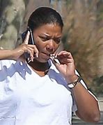 Image result for Photo of Queen Latifah Smoking a Cigar