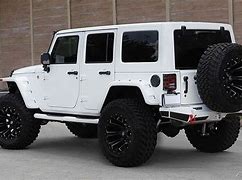 Image result for White 4 Door Jeep with Chrome Bumper