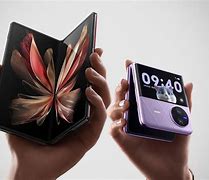 Image result for Latest Fold Phones in Rose Gold with Smart Watch and Pods