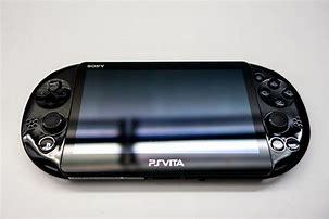 Image result for Black PS Vita with White Front Shell