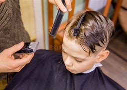 Image result for Kid Getting Haircut in Barber Shop