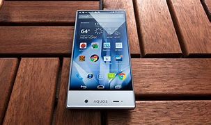 Image result for Sharp Phone with 3 Camera