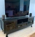 Image result for Flat Screen TV Cabinet with Folding Doors