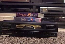 Image result for VCR Play Symbol Philips