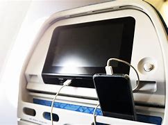 Image result for Charge Your Phone On the Plane