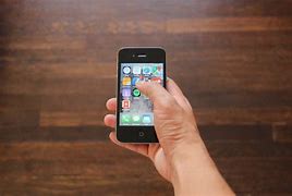 Image result for Hand Holding iPhone Back Side Showing