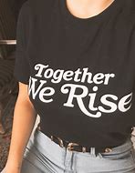 Image result for We Rise Tee Shirt