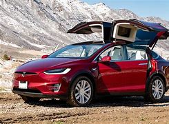 Image result for Tesla Model X Red On Road
