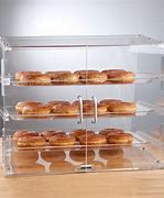 Image result for Donut in Glass Case