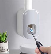 Image result for Automatic Toothpaste Dispenser