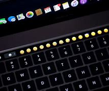 Image result for Backlit Magic Keyboard with Touch ID Arabic MacBook Pro
