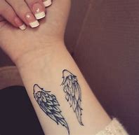 Image result for Small Wings Tattoo