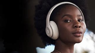 Image result for Images of Model Wearing a Pair of Beats Headset