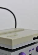 Image result for SNES Console with Game Inserted