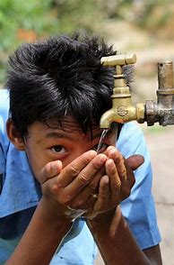 Image result for Picture of a Boy Drinking Tap Water