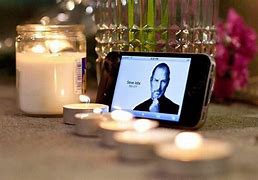 Image result for Steve Jobs On iPhone with Candle