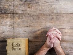 Image result for Praying Hands with Book