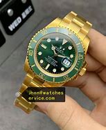 Image result for Rolex Submariner Green and Gold