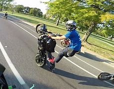 Image result for Motorcycle Wheelie