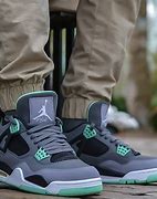 Image result for Air Jordan 4 Green Glow