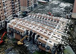 Image result for China Apartment Building Falls Over