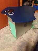 Image result for Apple Laptop in Table