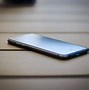 Image result for Apple with iPhone On Table