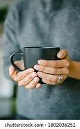 Image result for Woman Holding Giant Coffee Mug