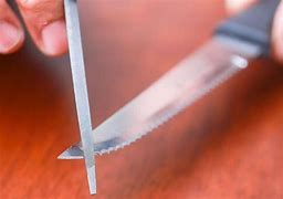 Image result for Rostfrei Serrated Blade Pocket Knife