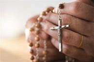 Image result for Woman Praying with Rosary