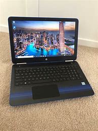 Image result for HP Pavilion Light Blue and Black Laptop