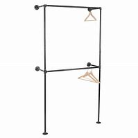 Image result for Clothes Rack Against Wall