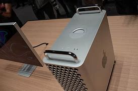Image result for Holding Mac Pro